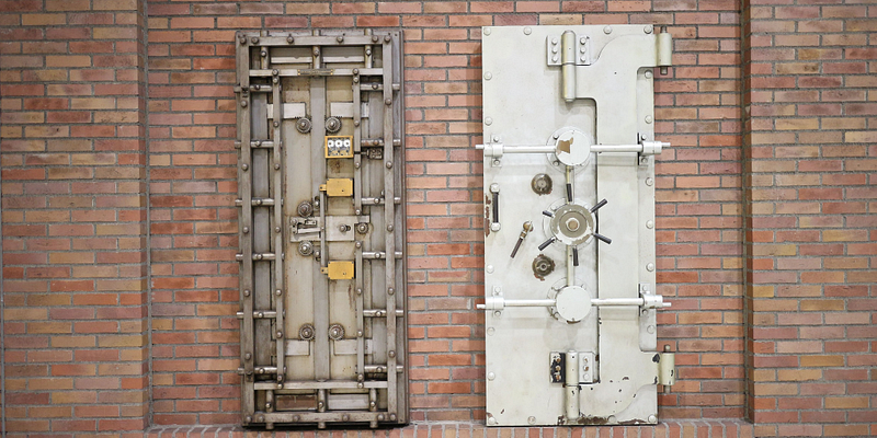 the front and back view of highly secure doors with complex locking mechanisms